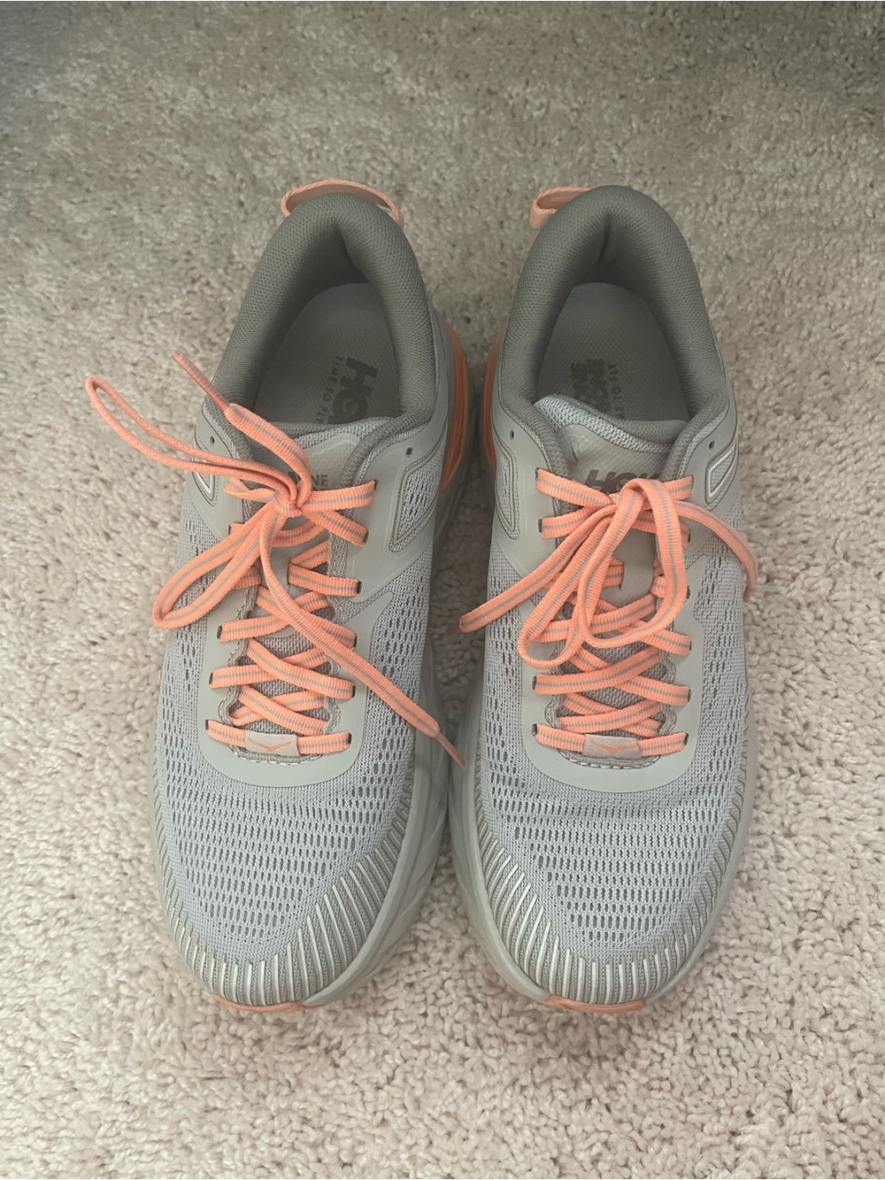 Hoka Women's Light Gray Running Shoes with Peach Accents